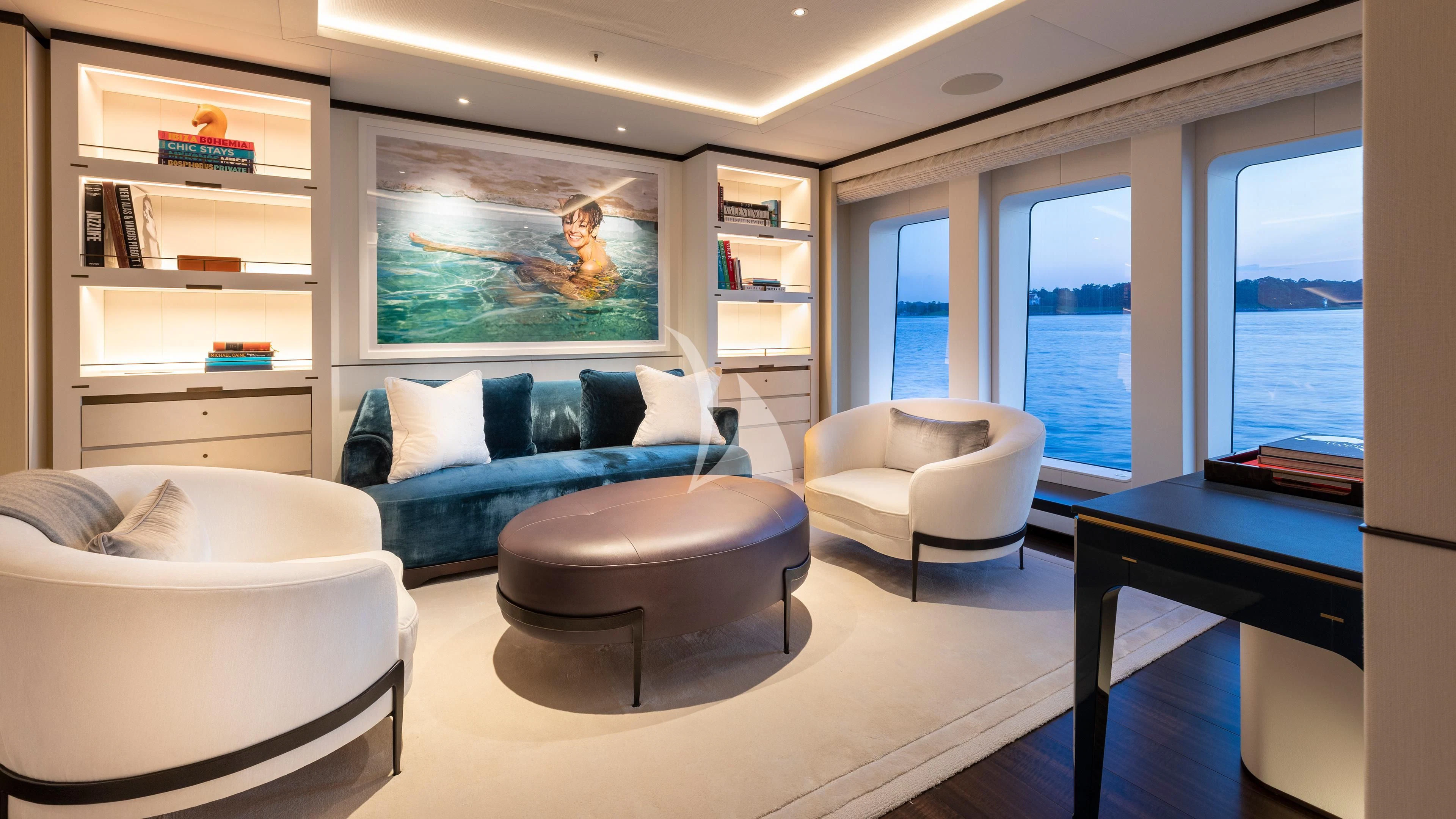a living room with a large window aboard LUNASEA Yacht for Sale