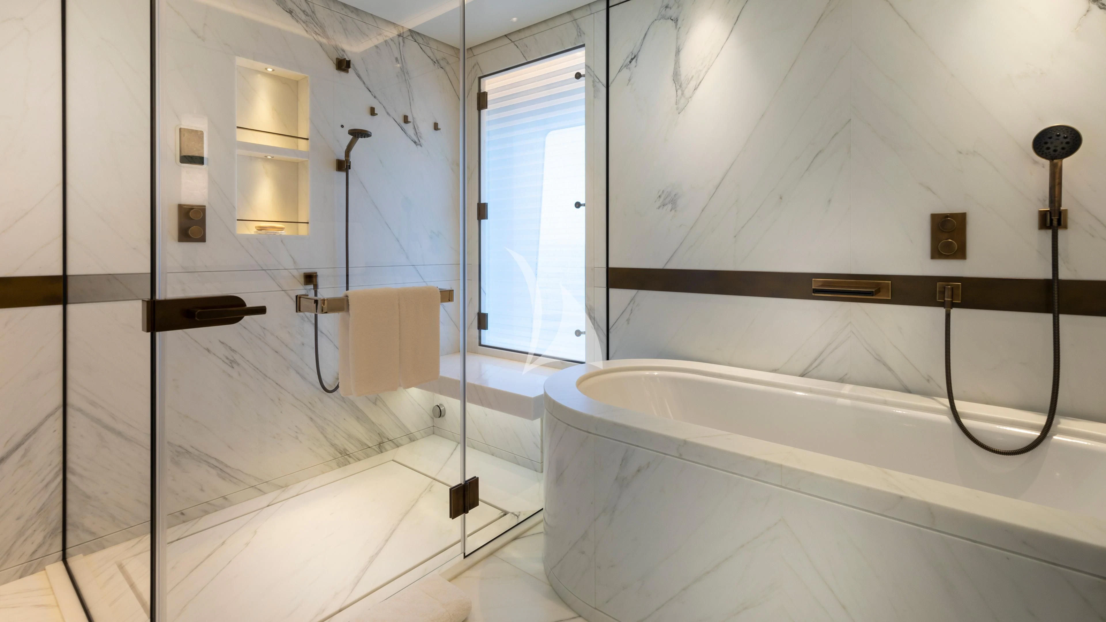 a bathroom with a tub and shower aboard LUNASEA Yacht for Sale
