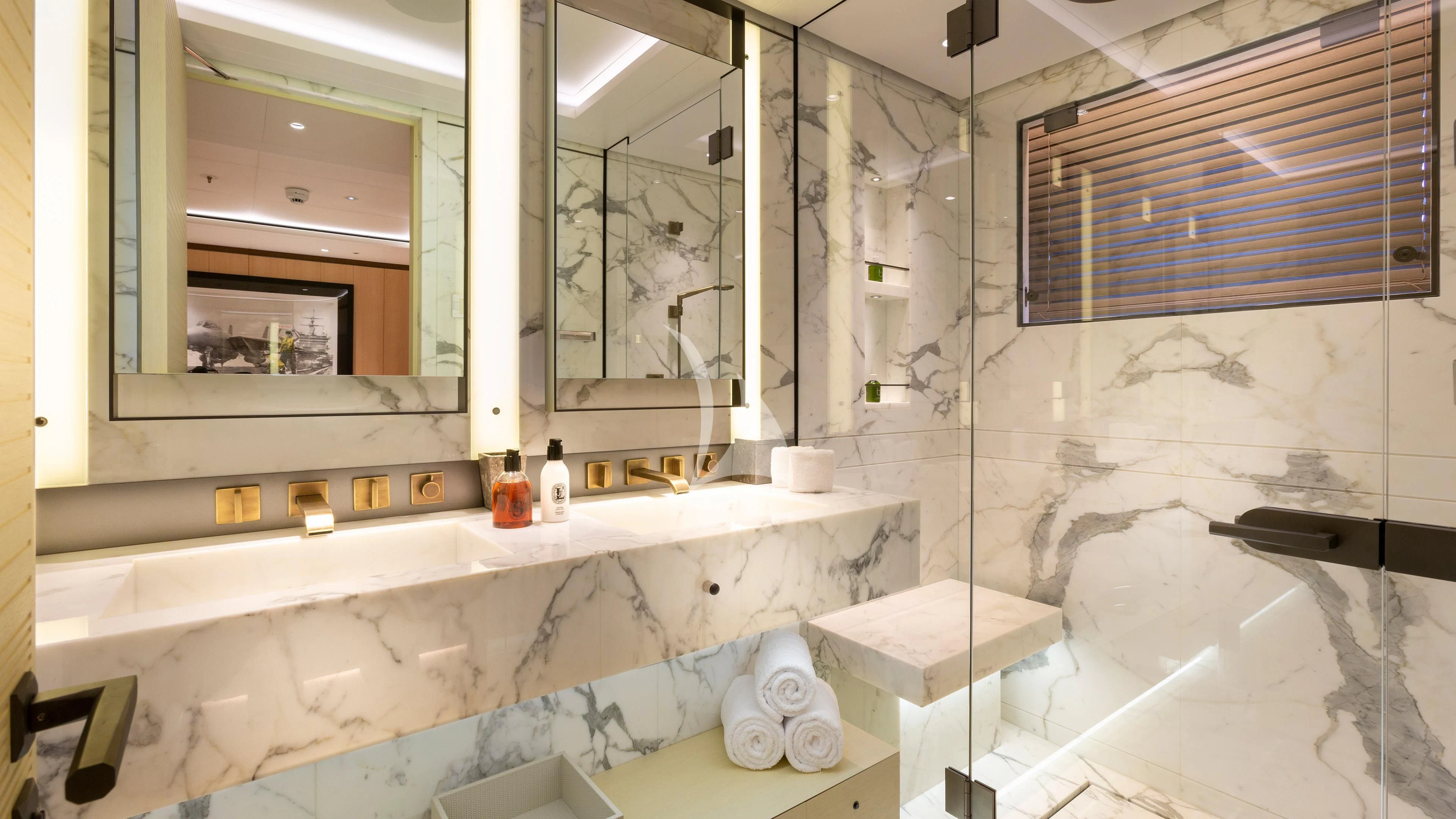 a bathroom with a tub and shower aboard LUNASEA Yacht for Sale