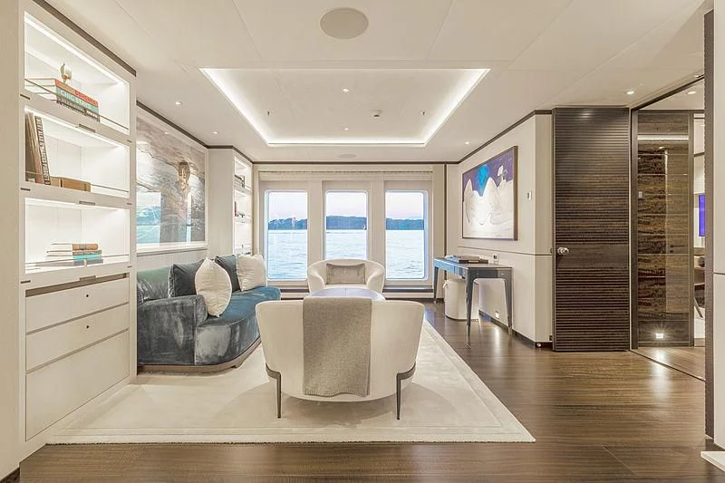 a living room with a large window aboard LUNASEA Yacht for Sale