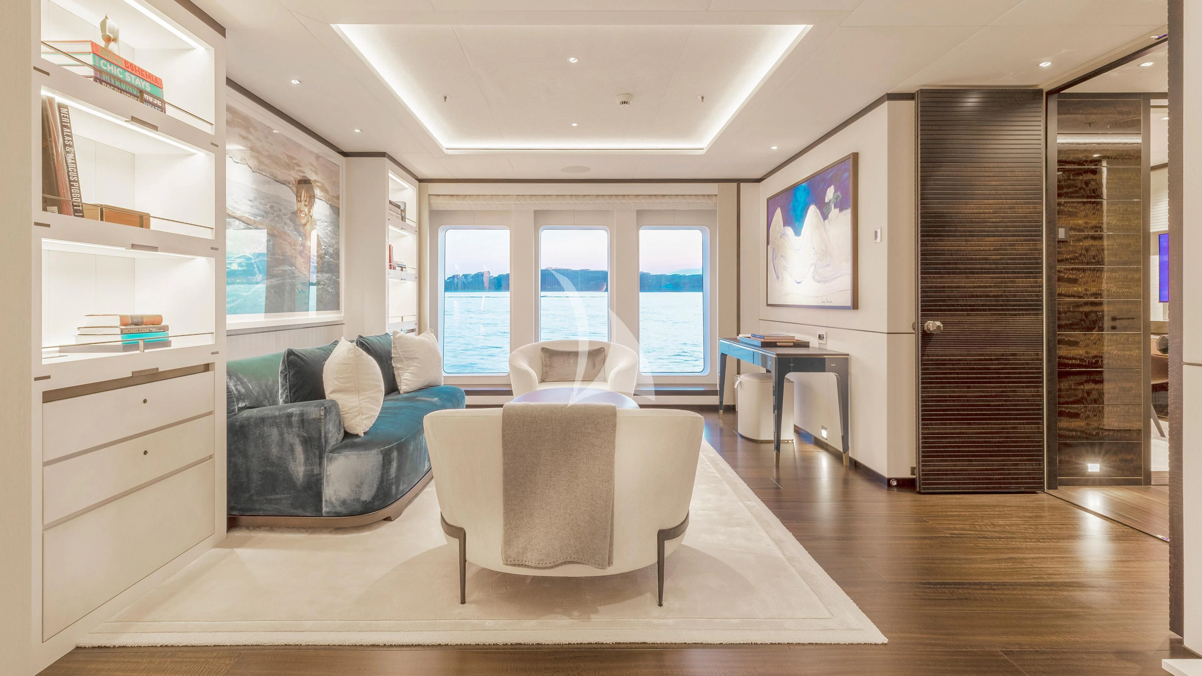 a living room with a large window aboard LUNASEA Yacht for Sale
