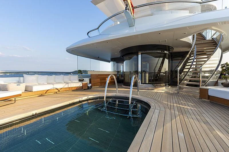 a pool on a deck aboard LUNASEA Yacht for Sale