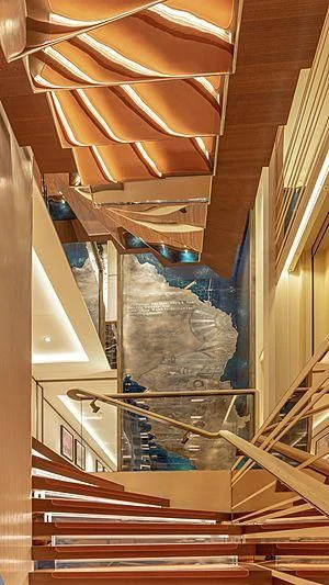 a staircase with a slide aboard LUNASEA Yacht for Sale
