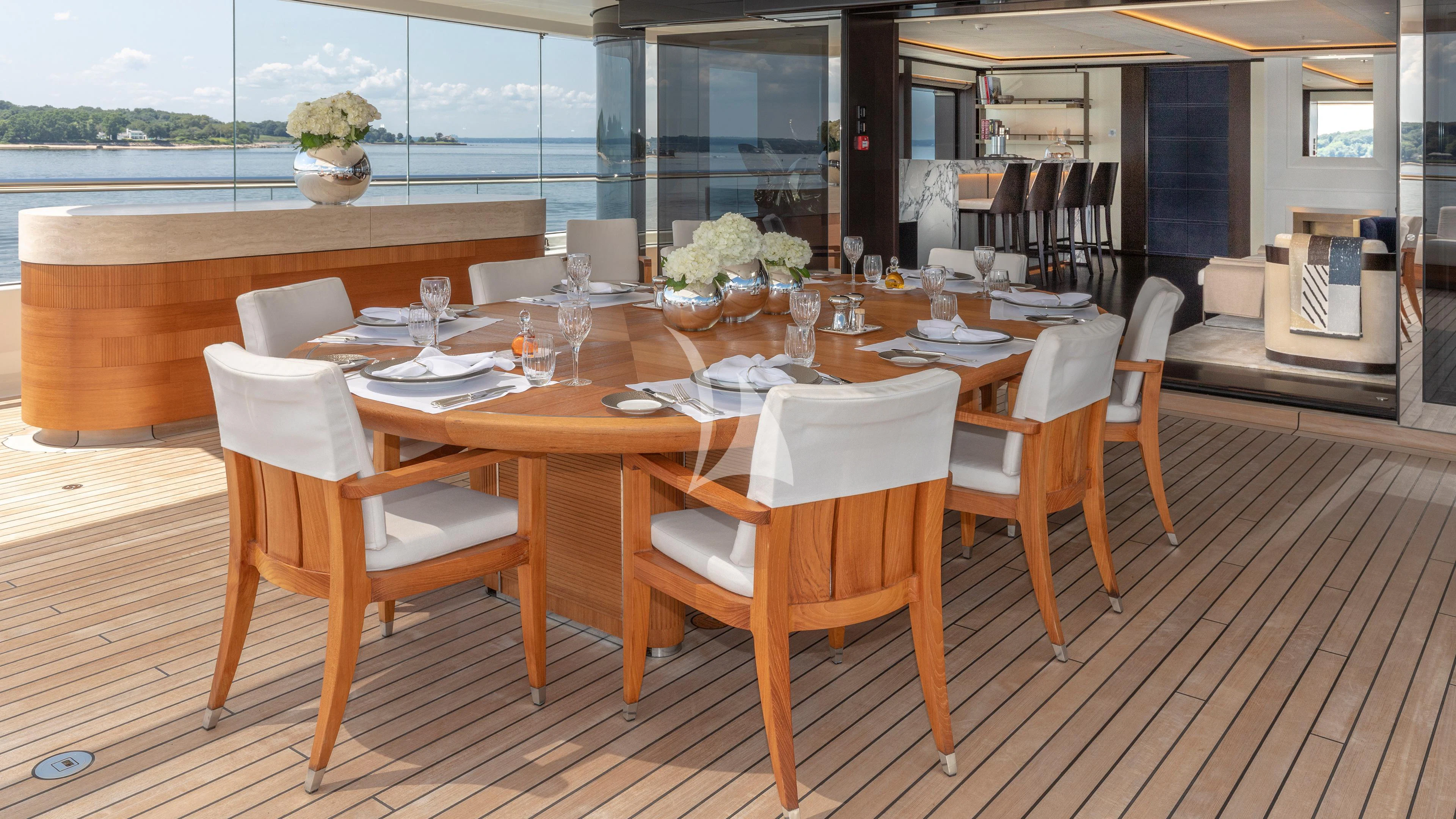 a table set for a dinner aboard LUNASEA Yacht for Sale