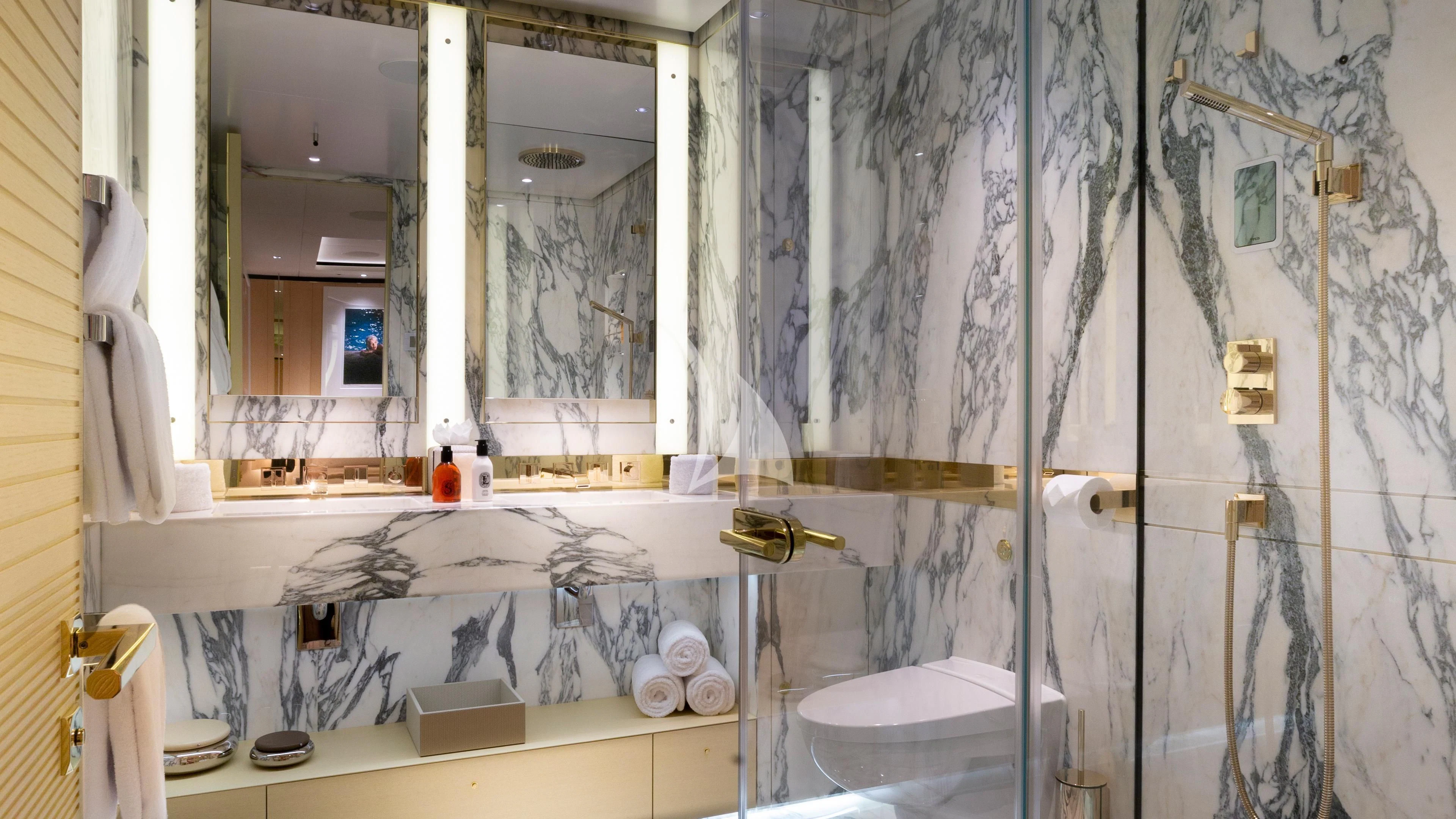 a bathroom with a large shower curtain aboard LUNASEA Yacht for Sale