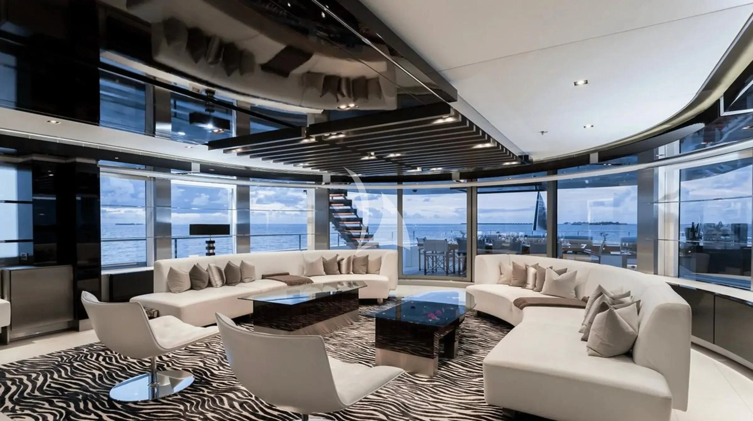 a living room with a large window aboard TOTEM Yacht for Sale