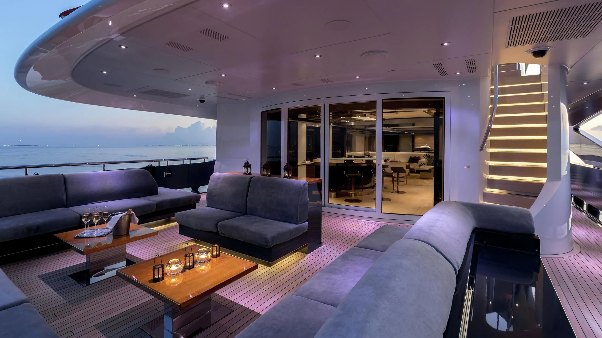 a living room with a couch and a table aboard TOTEM Yacht for Sale