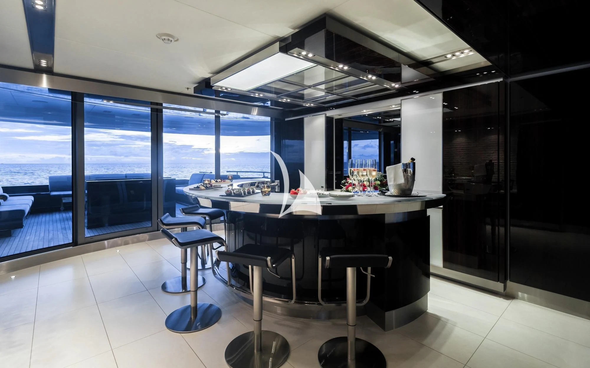 a large kitchen with a large window aboard TOTEM Yacht for Sale