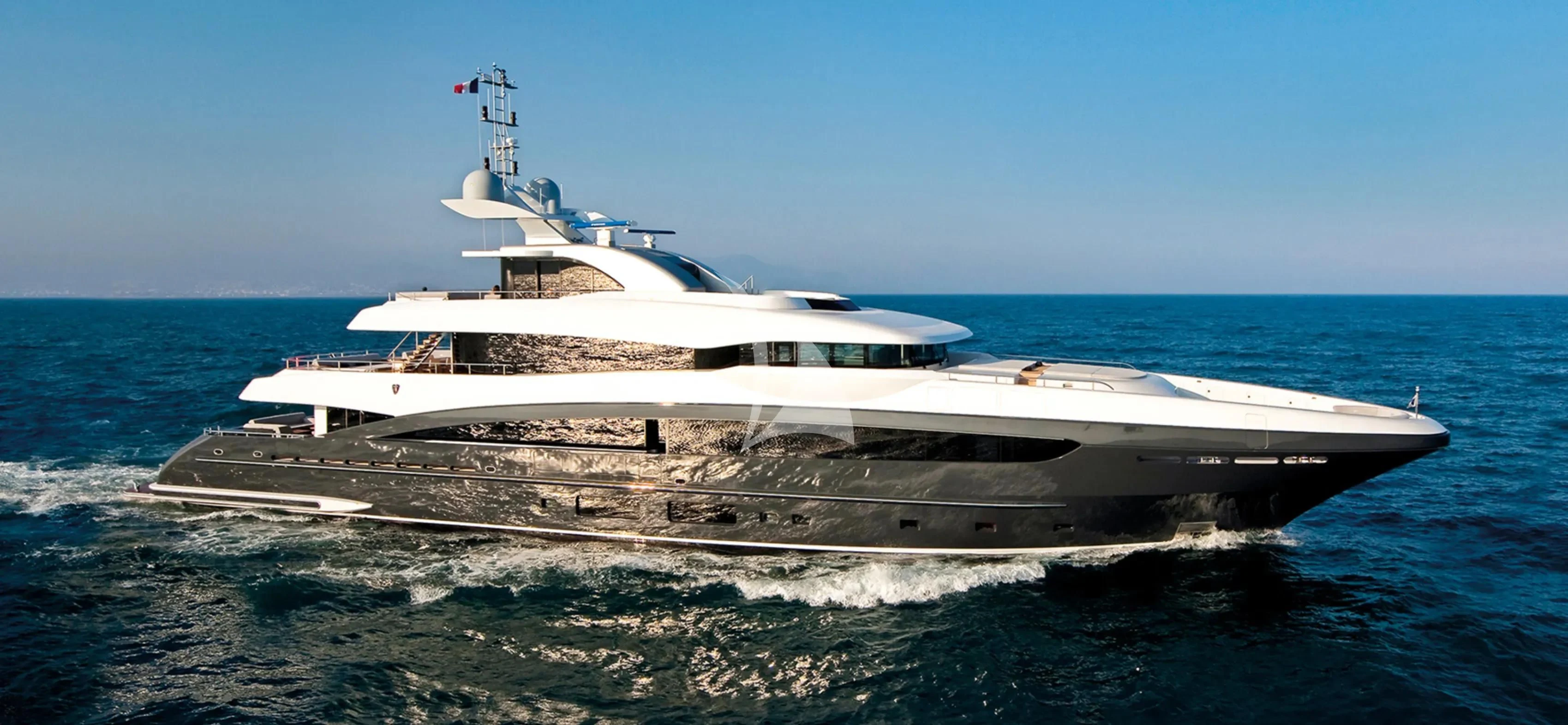 a white yacht on the water aboard TOTEM Yacht for Sale