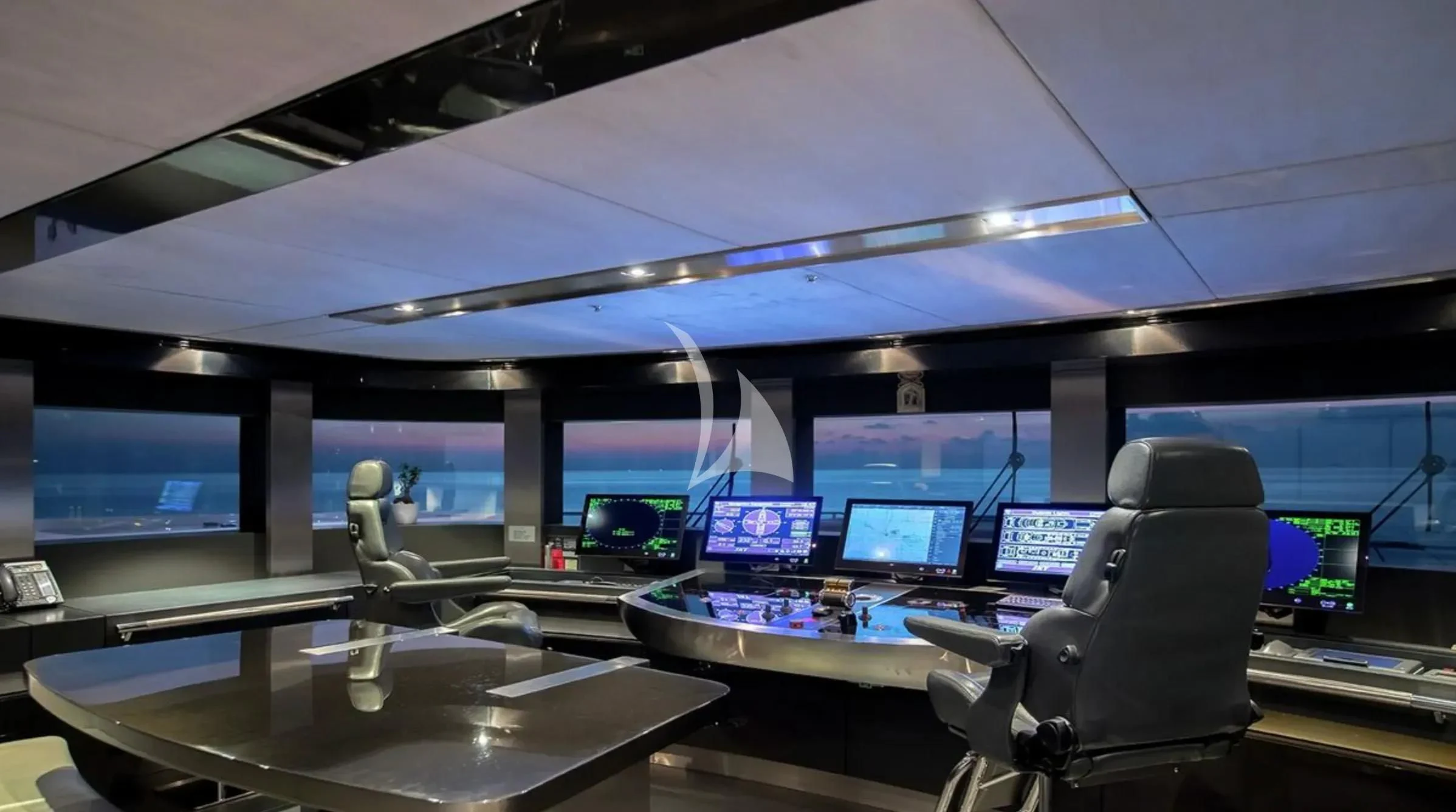 a room with many monitors aboard TOTEM Yacht for Sale