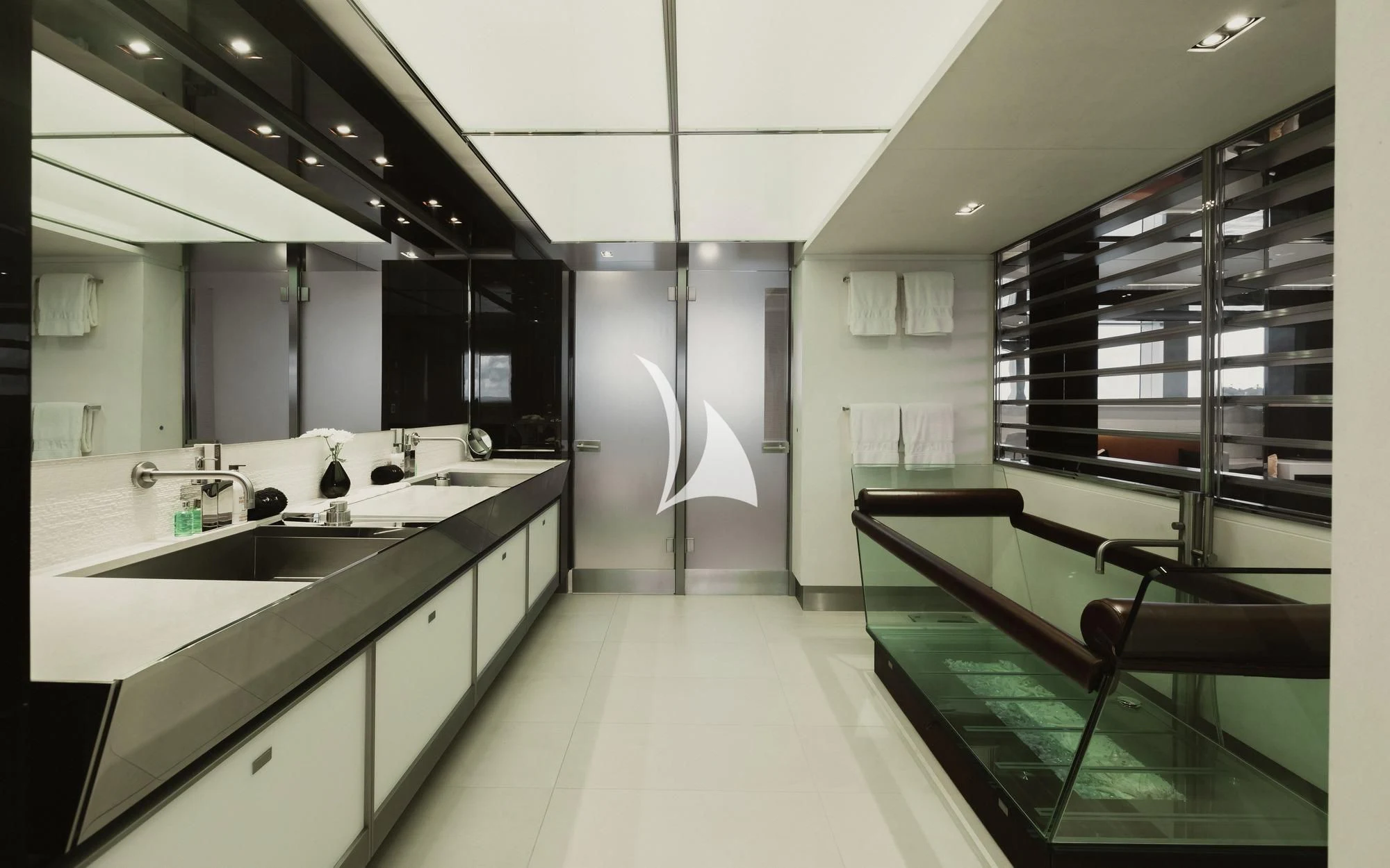 a bathroom with a large shower aboard TOTEM Yacht for Sale