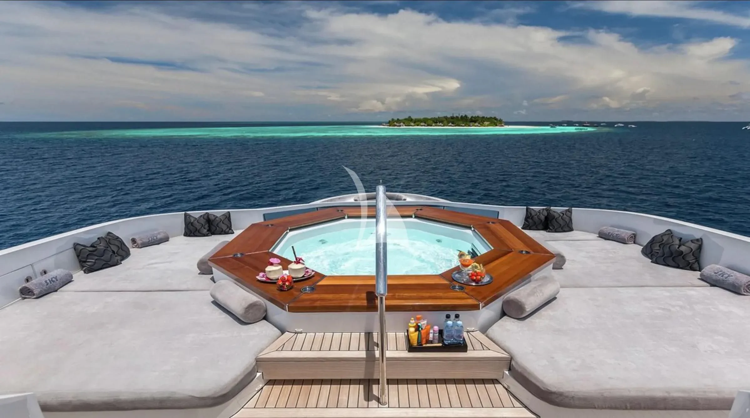 a boat on a beach aboard TOTEM Yacht for Sale