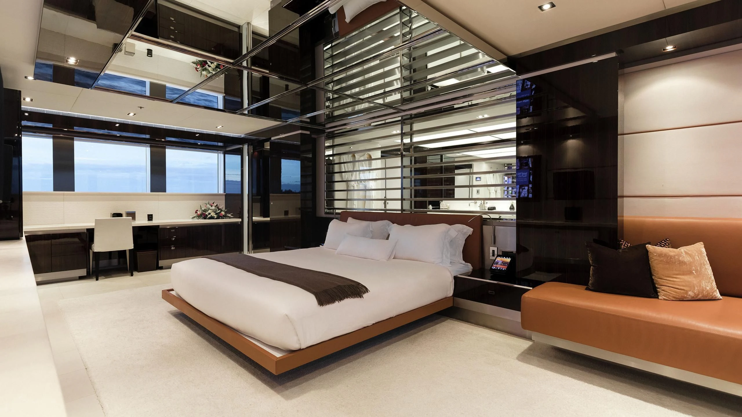 a room with a bed and a couch aboard TOTEM Yacht for Sale