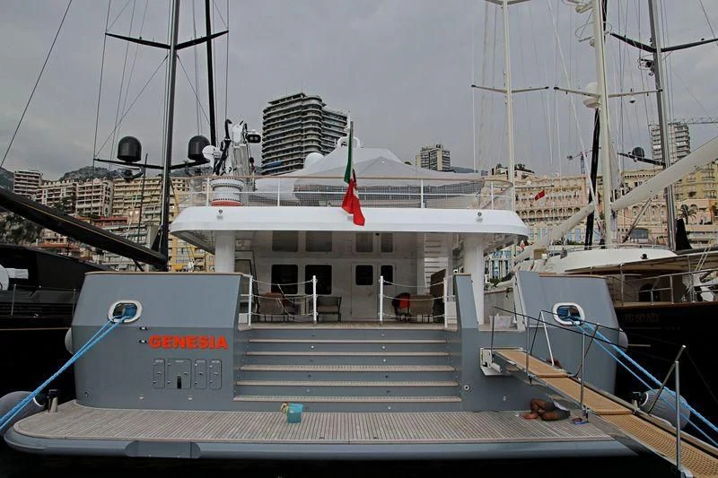 a boat docked at a pier aboard GENESIA Yacht for Sale