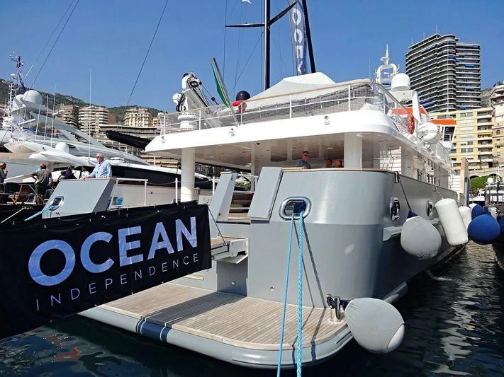 a boat docked at a pier aboard GENESIA Yacht for Sale