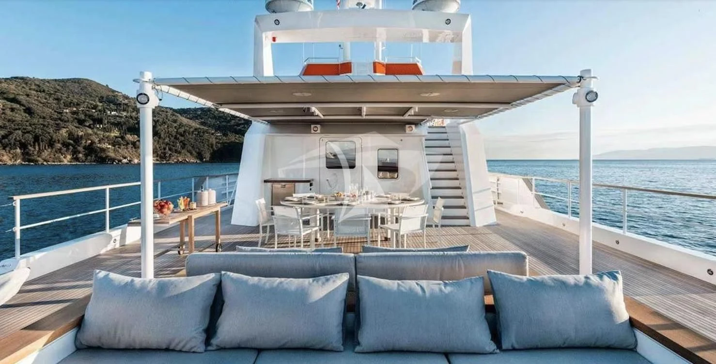 a large white house with a balcony aboard GENESIA Yacht for Sale
