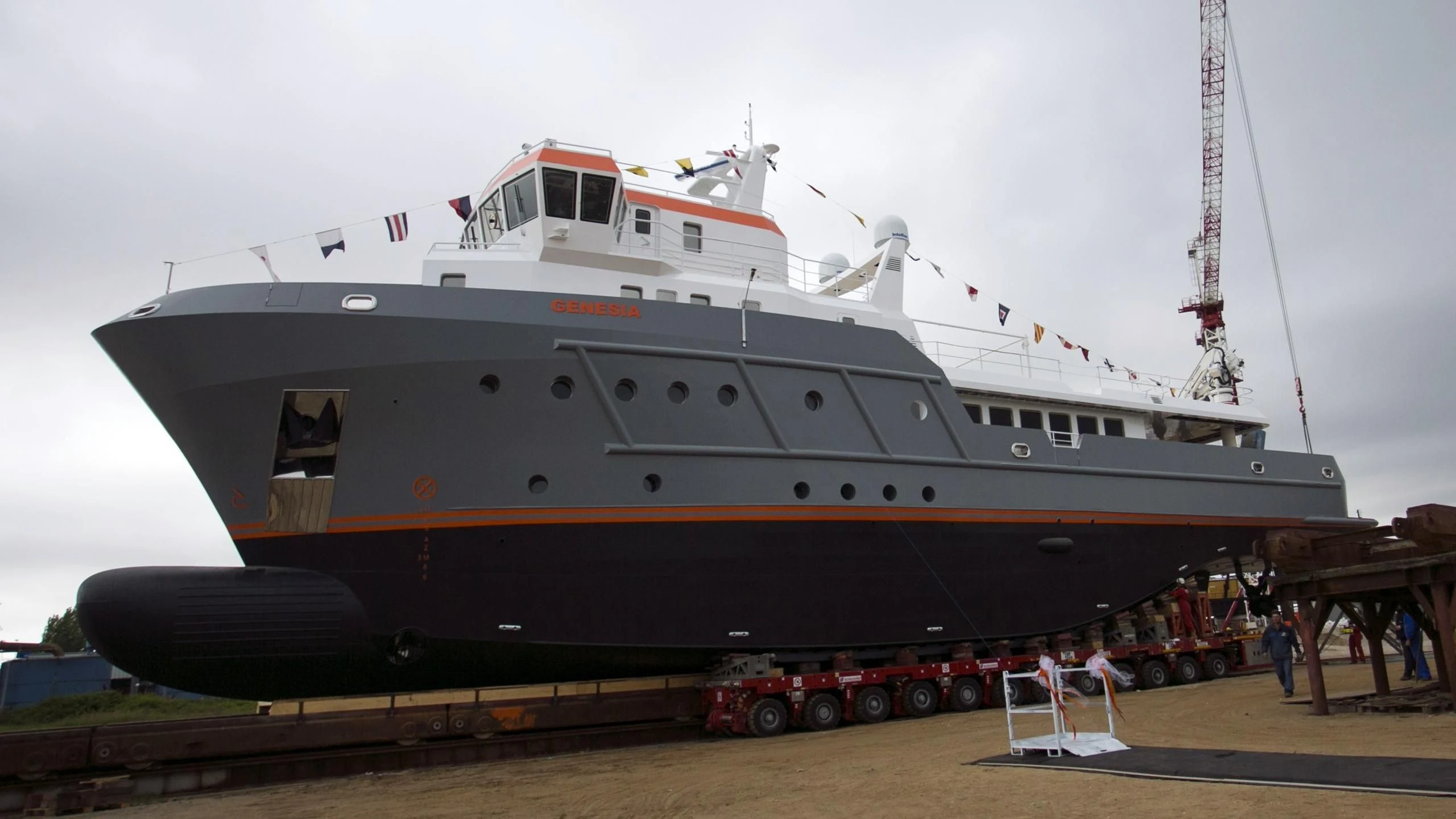 a large ship on a dock aboard GENESIA Yacht for Sale