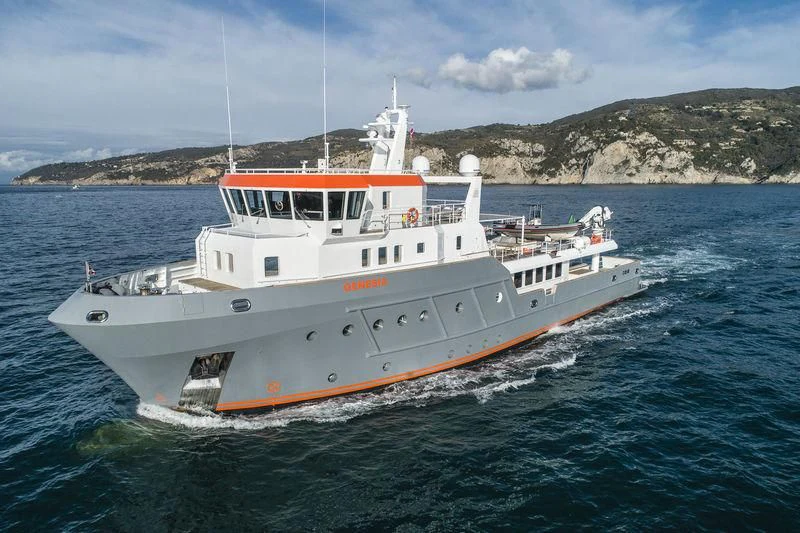 a large white boat on water aboard GENESIA Yacht for Sale