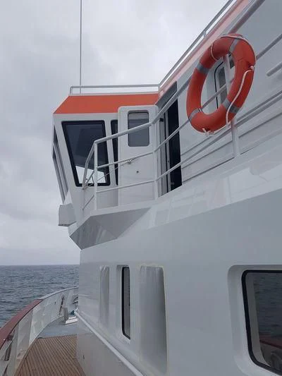 a boat with a steering wheel aboard GENESIA Yacht for Sale