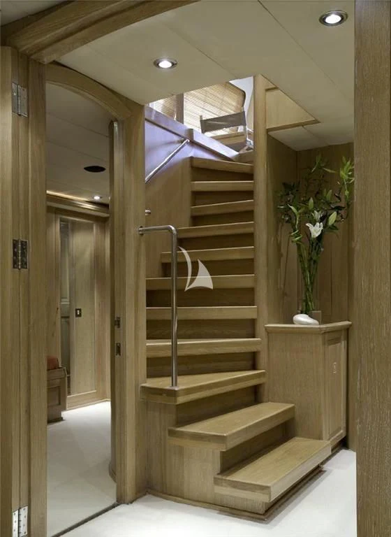 a staircase in a house aboard ALTHEA Yacht for Sale