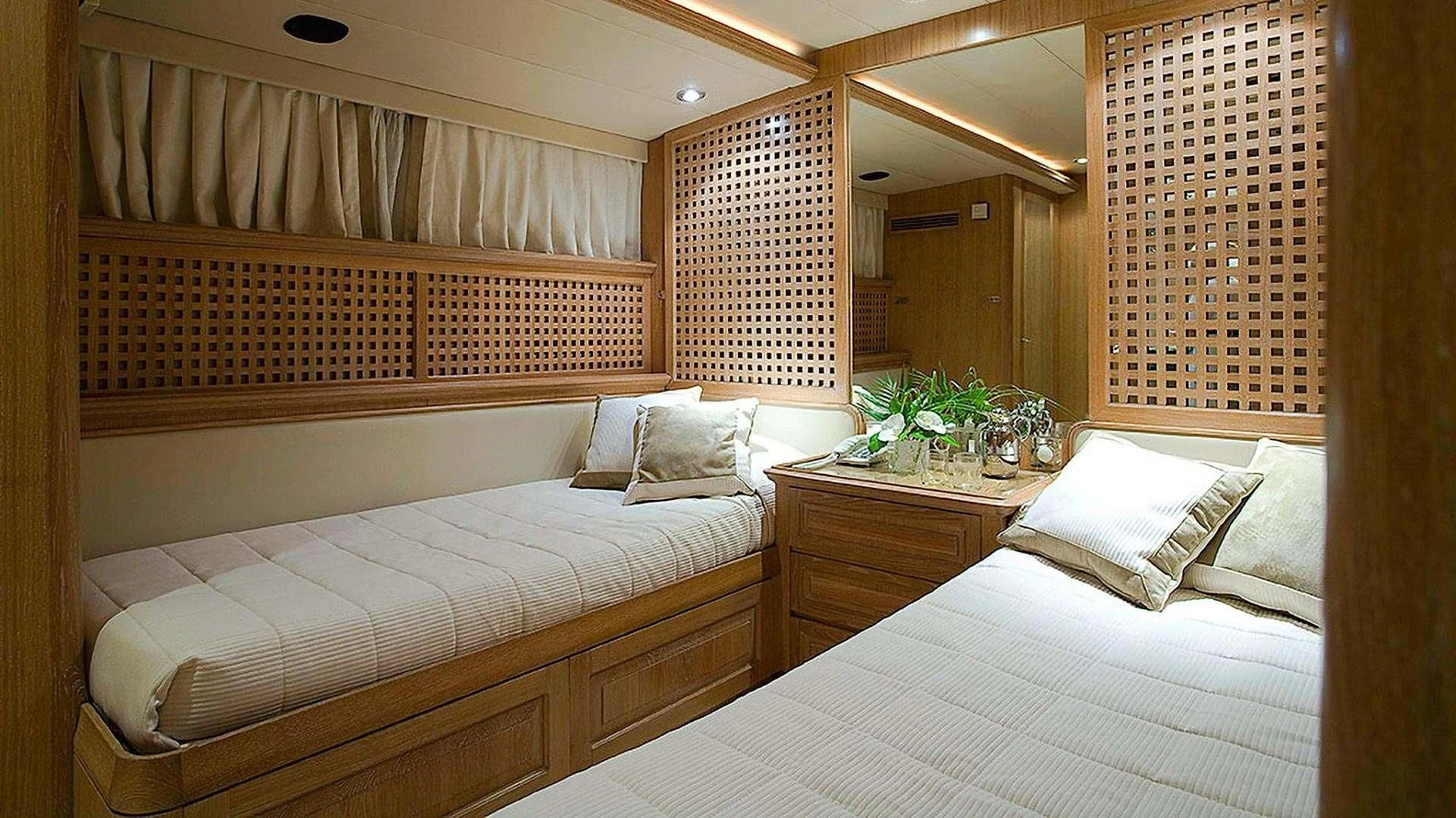 a room with two beds aboard ALTHEA Yacht for Sale