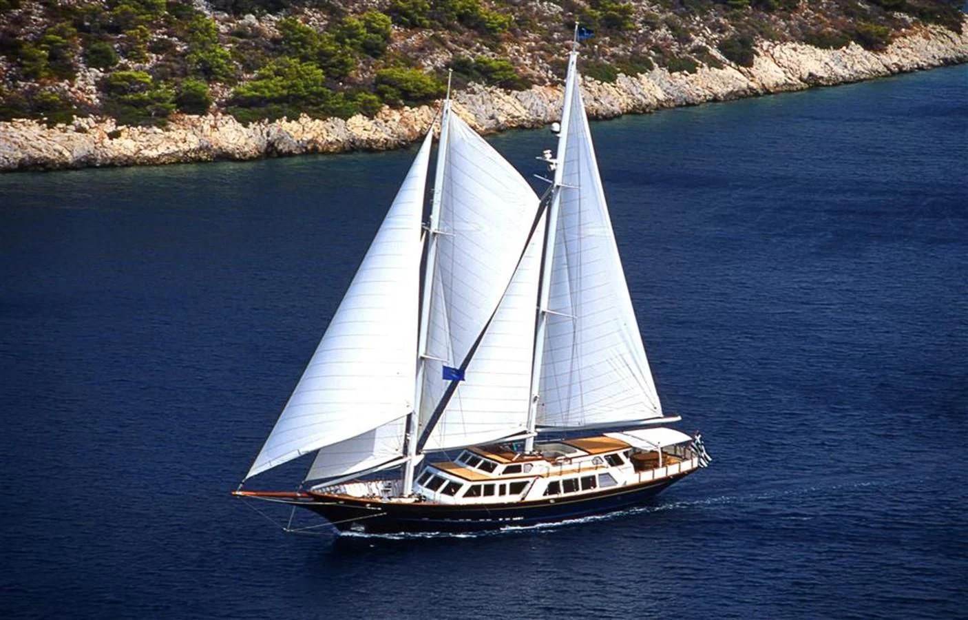a sailboat on the water aboard ALTHEA Yacht for Sale