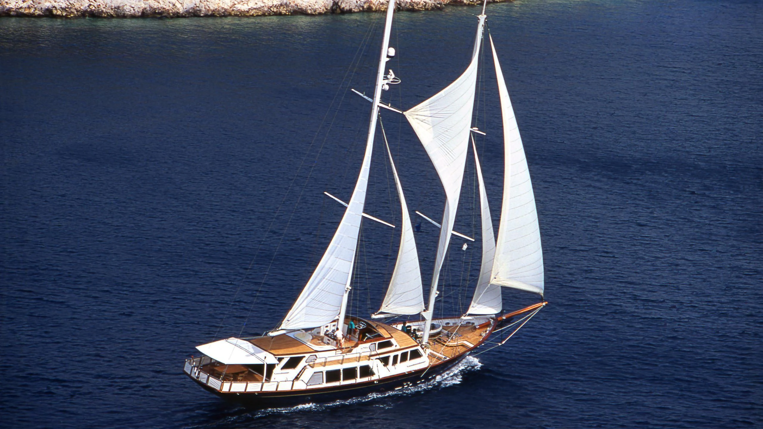 a sailboat on the water aboard ALTHEA Yacht for Sale