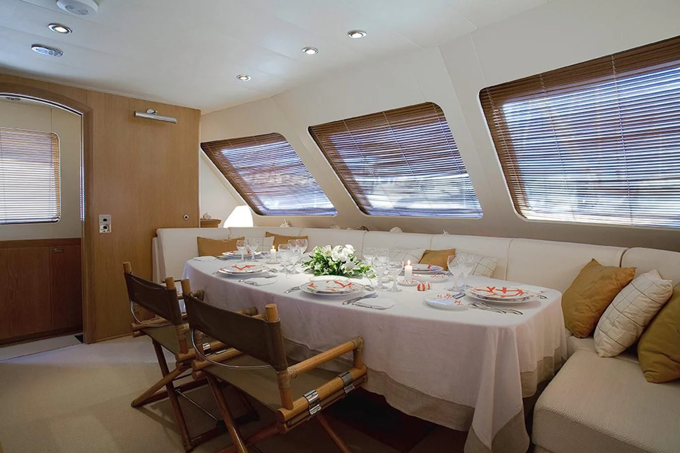 a dining table in a room aboard ALTHEA Yacht for Sale