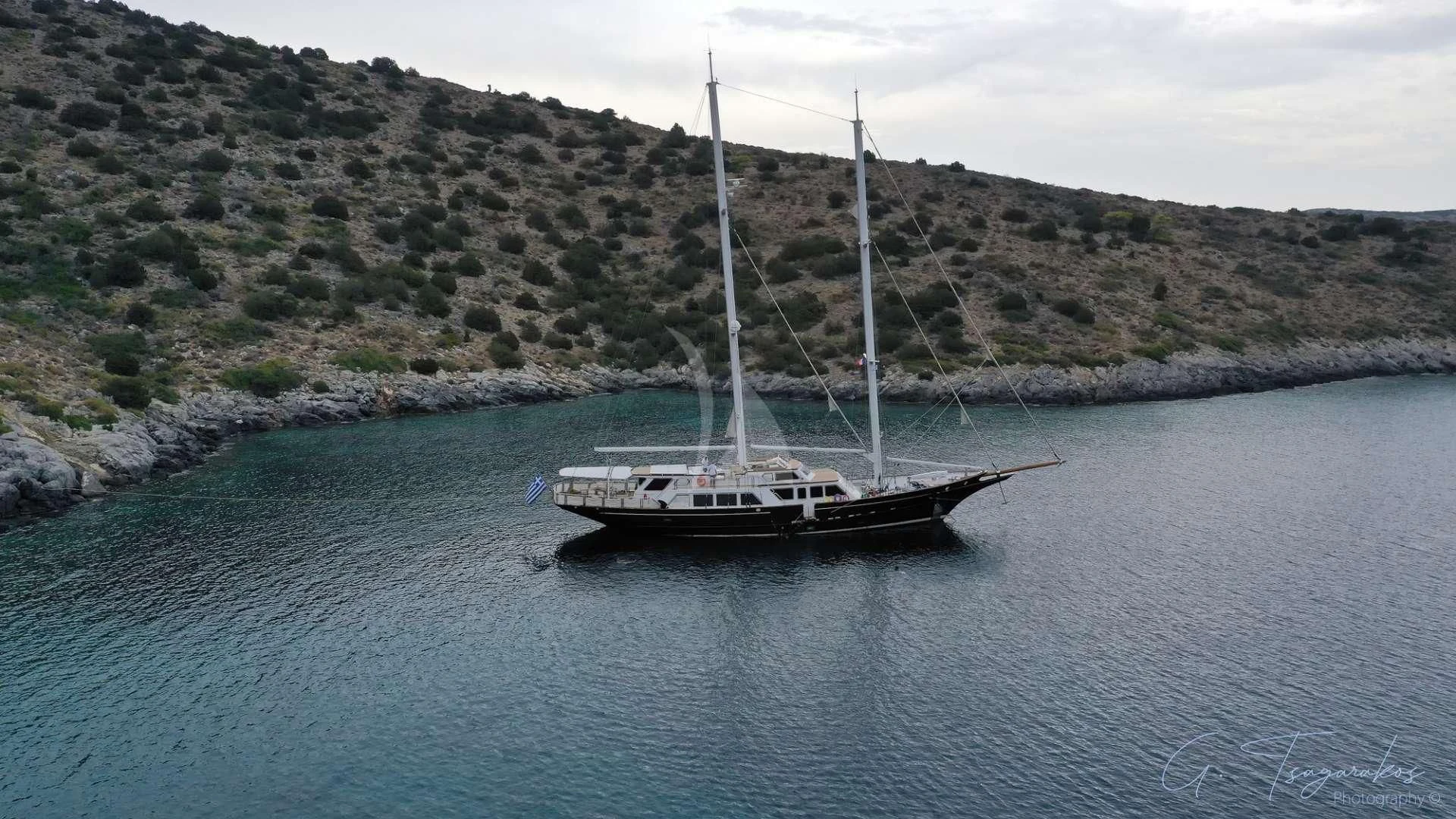 a boat sailing on the water aboard ALTHEA Yacht for Sale