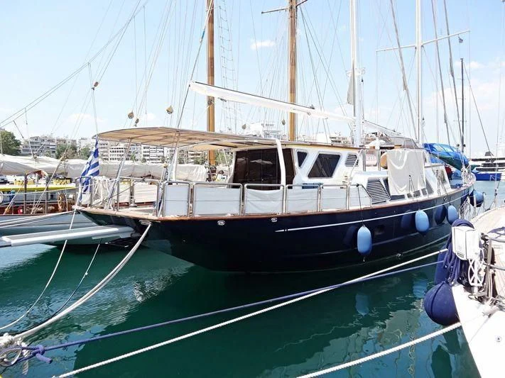 a boat docked at a pier aboard ALTHEA Yacht for Sale