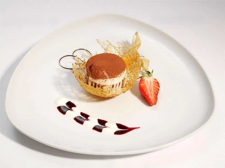 a plate with food on it aboard ALTHEA Yacht for Sale