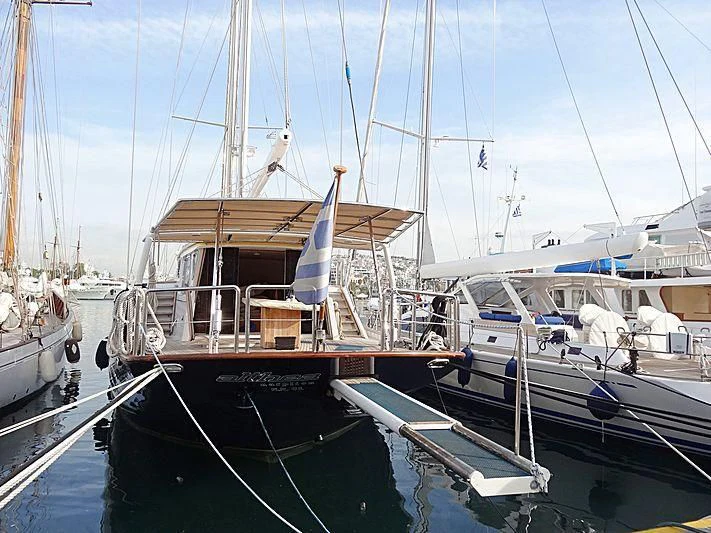 a group of boats are parked in a harbor aboard ALTHEA Yacht for Sale