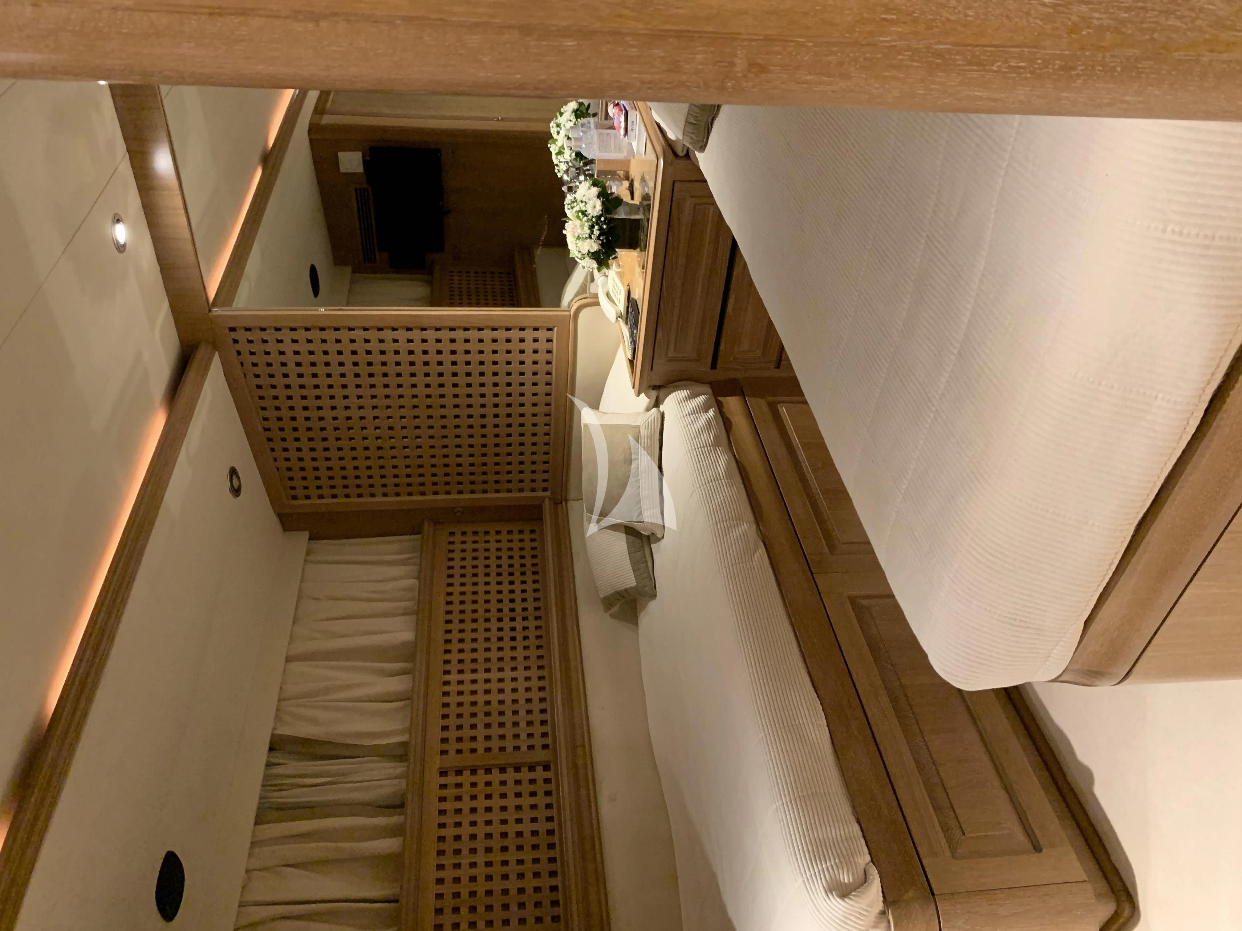 a room with a table and chairs aboard ALTHEA Yacht for Sale