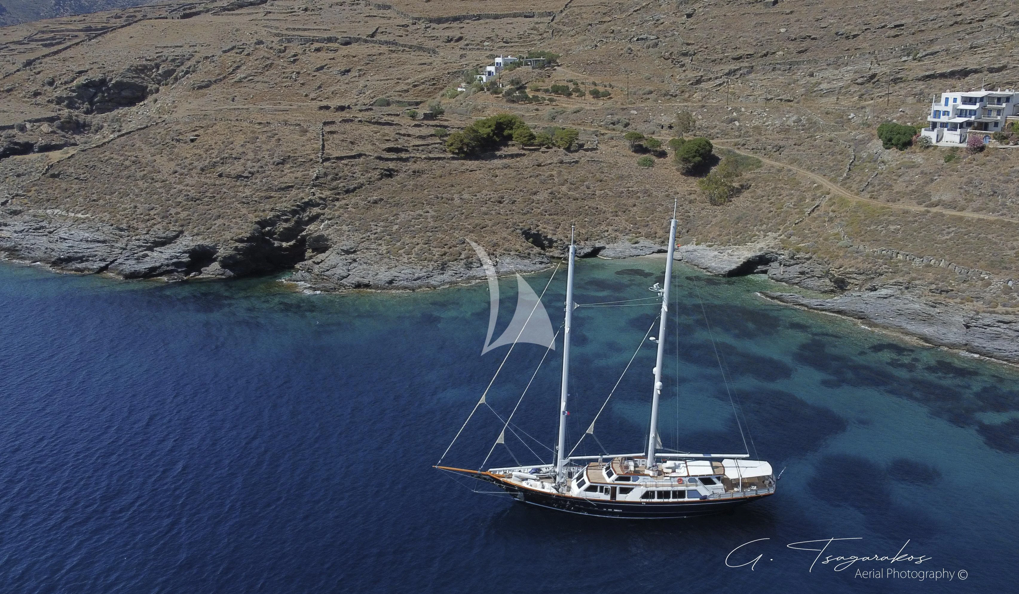 a boat sailing on the water aboard ALTHEA Yacht for Sale