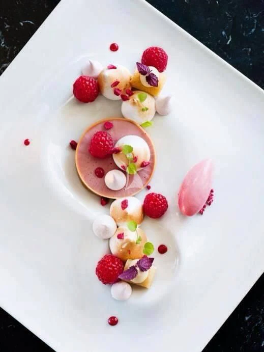 a plate of desserts aboard ALTHEA Yacht for Sale