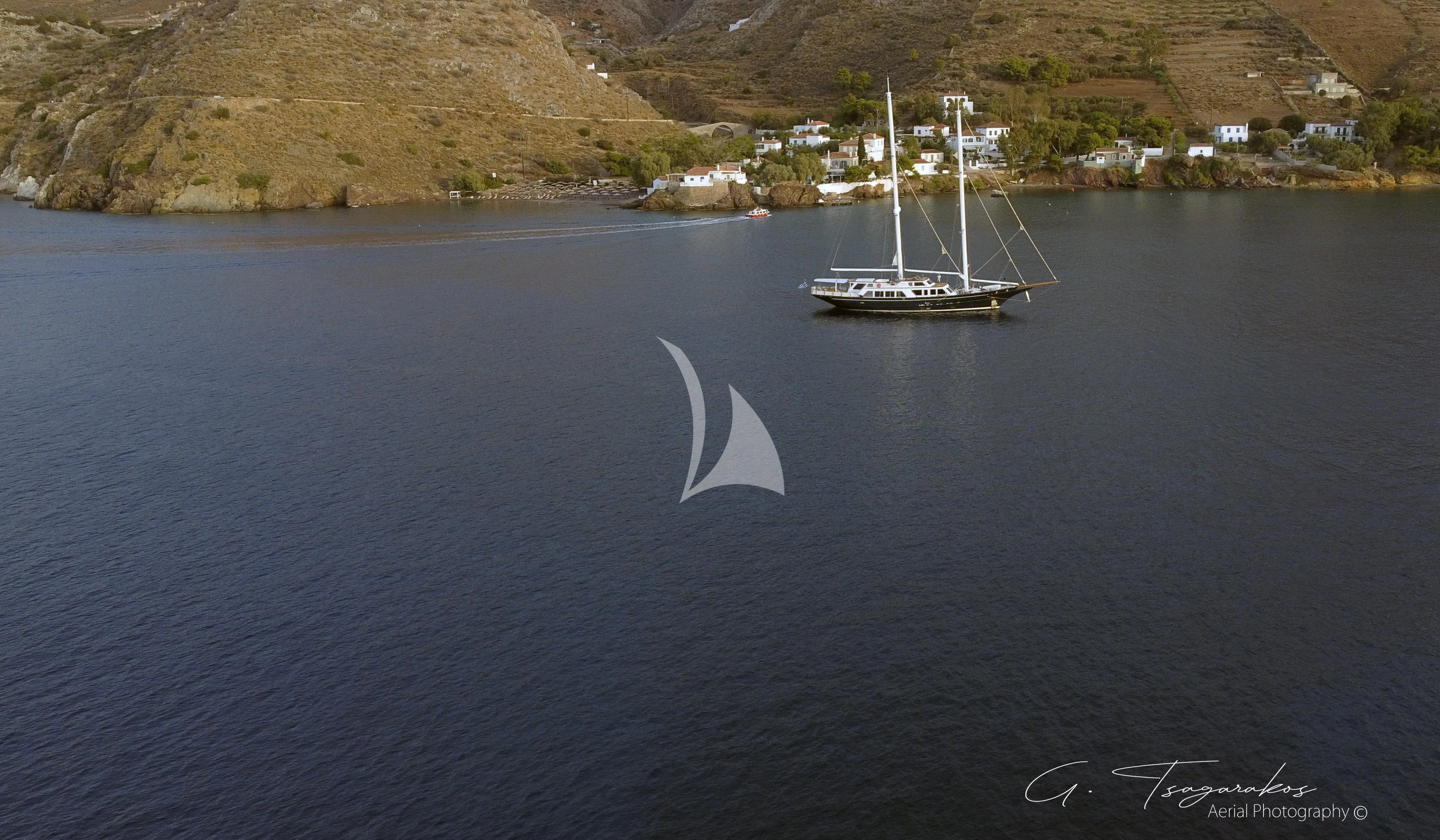 a boat sailing on the water aboard ALTHEA Yacht for Sale