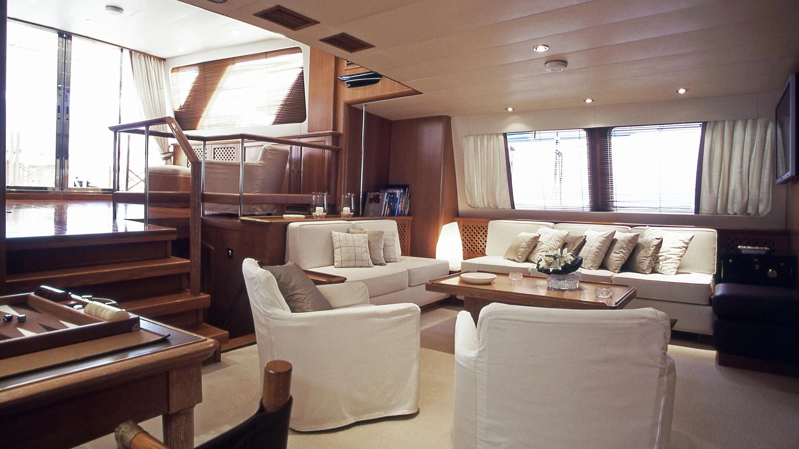 a living room with a couch and a table aboard ALTHEA Yacht for Sale