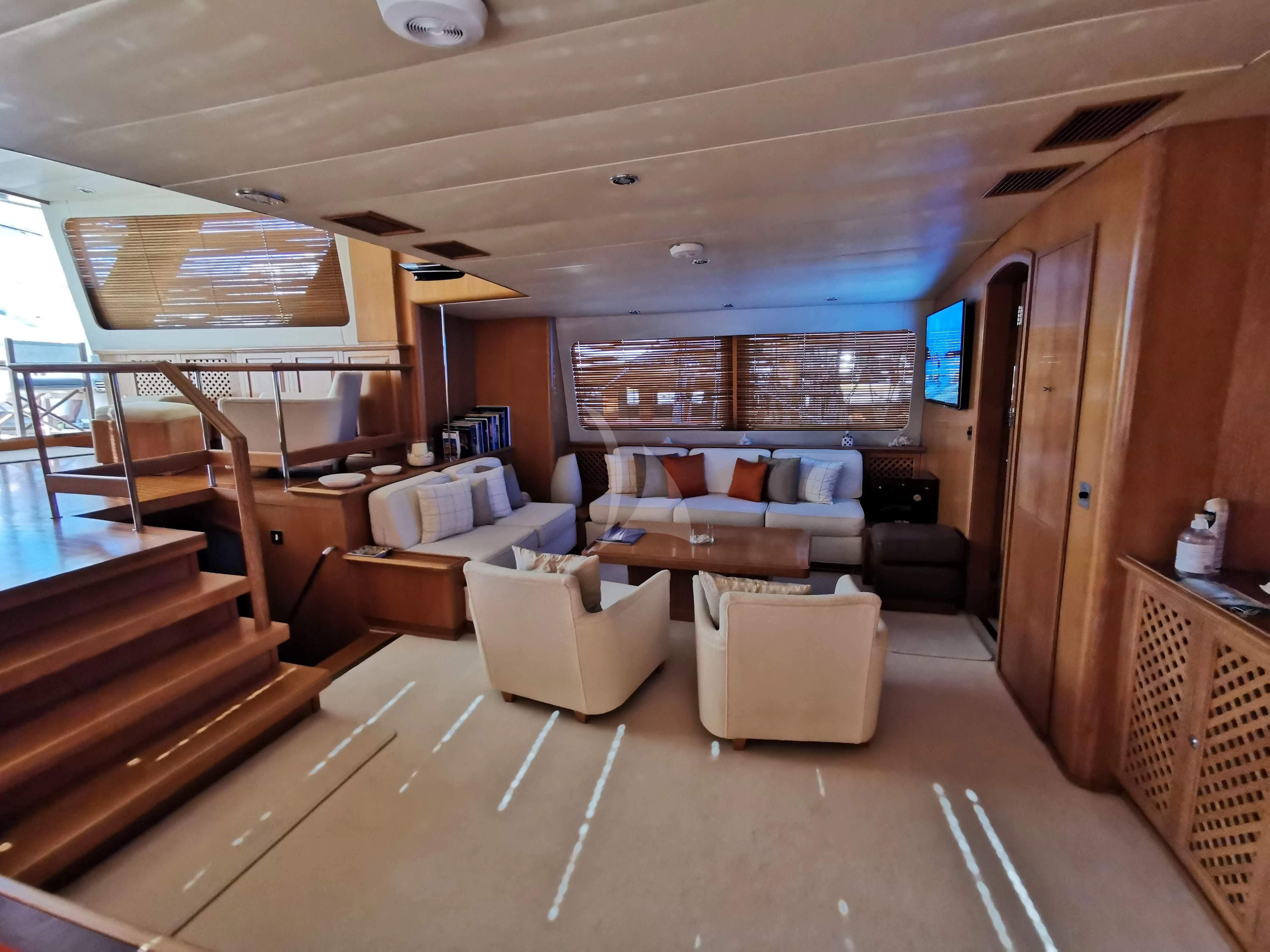 a living room with a large window aboard ALTHEA Yacht for Sale