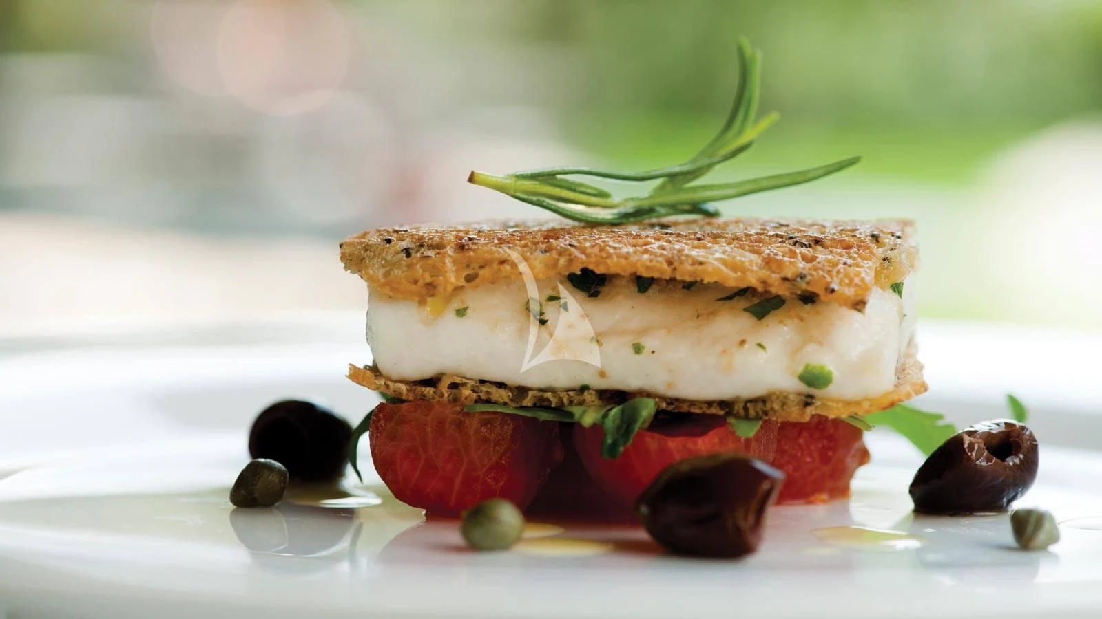 a sandwich with fruit on a plate aboard ALTHEA Yacht for Sale
