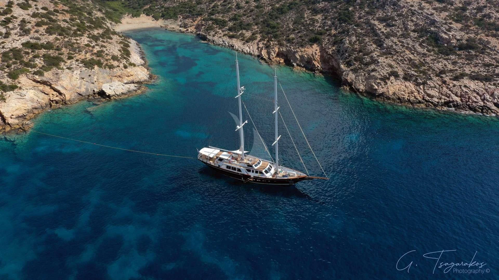 a boat sailing on the water aboard ALTHEA Yacht for Sale