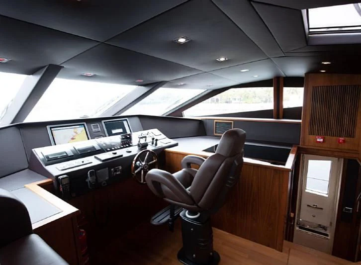 a room with a desk and computer aboard BARBIZON Yacht for Sale