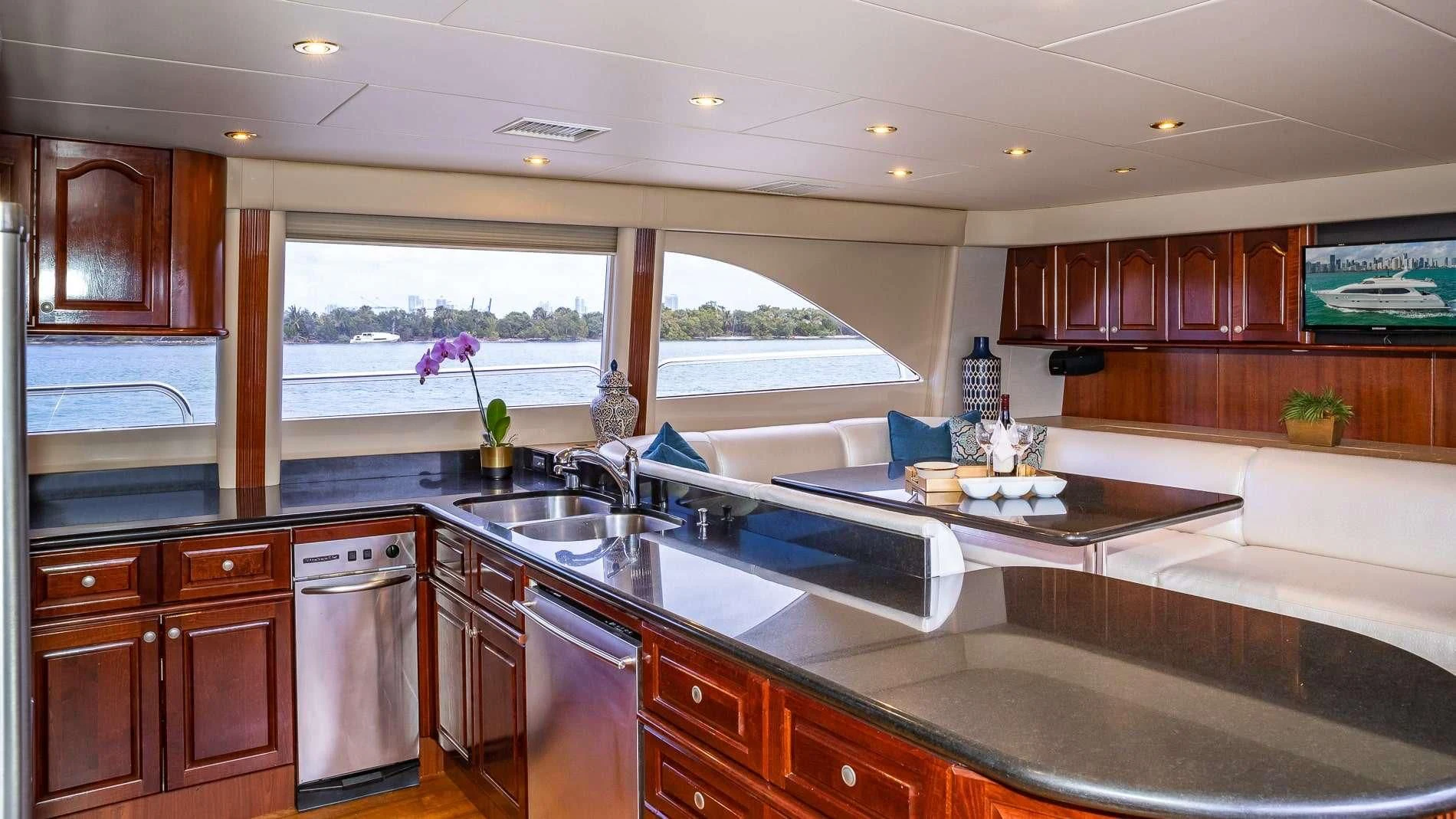 a kitchen with a large window aboard TRANQUILITY IV Yacht for Sale