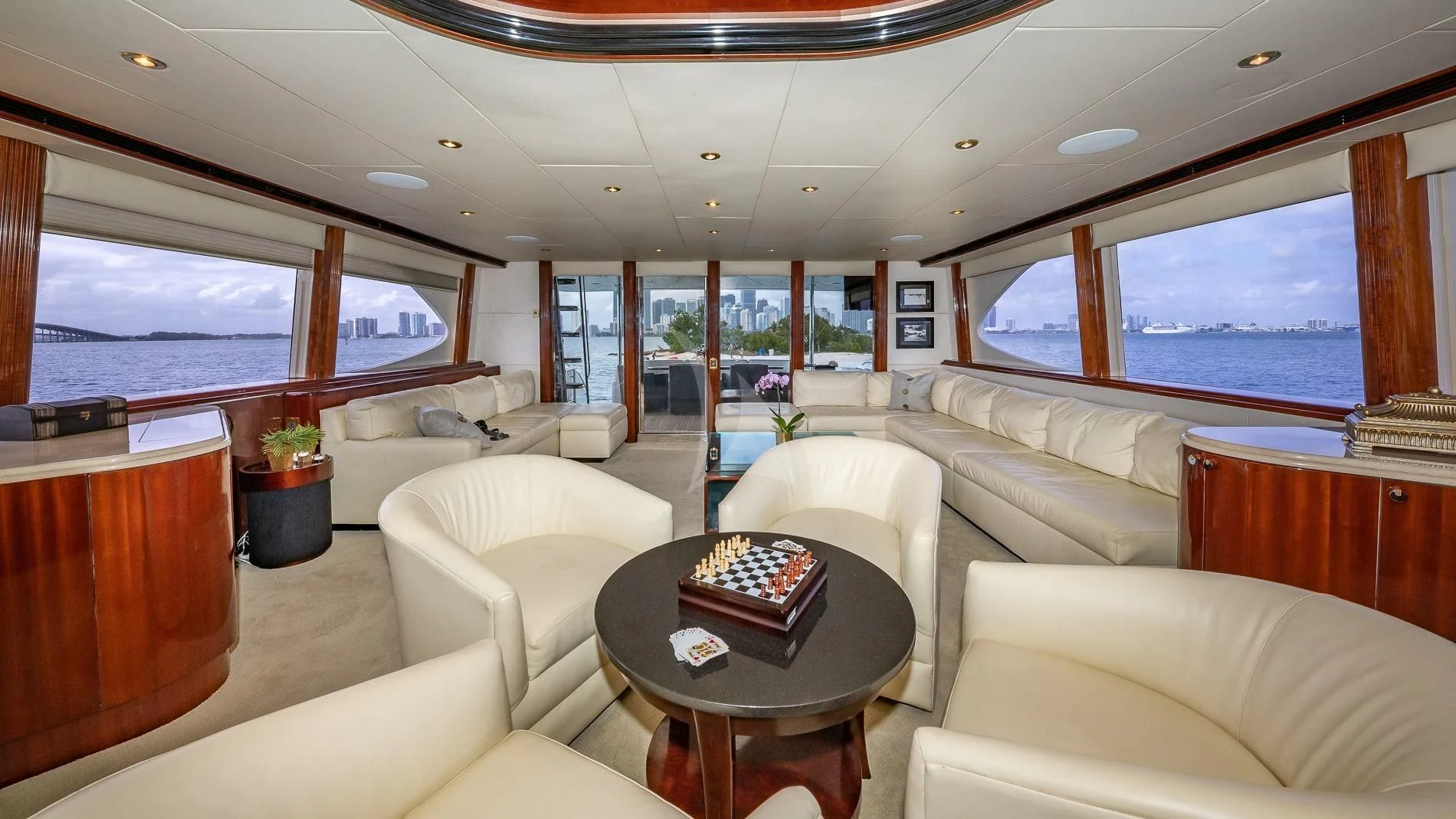a living room with a large window aboard TRANQUILITY IV Yacht for Sale
