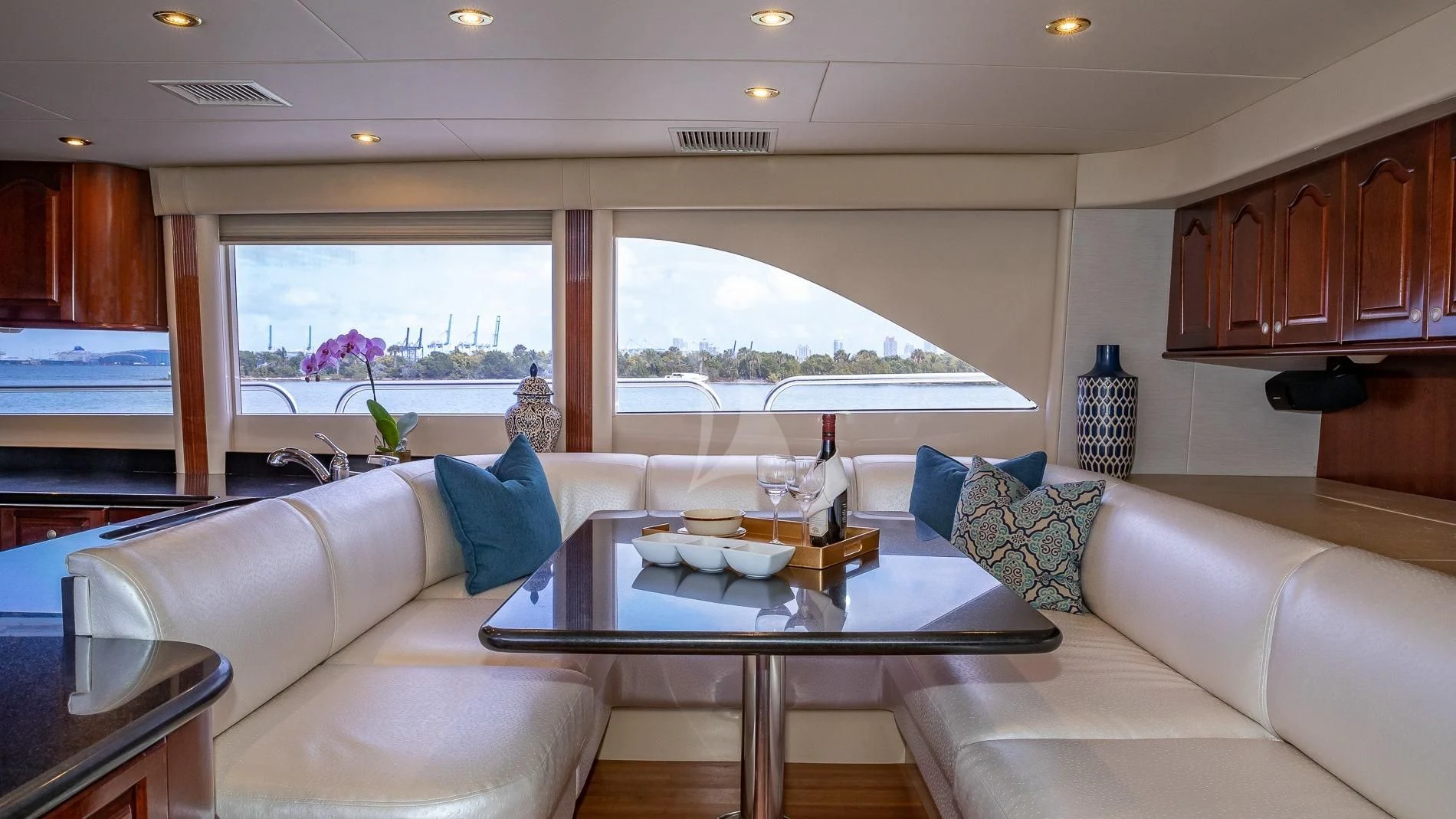 a living room with a large window aboard TRANQUILITY IV Yacht for Sale