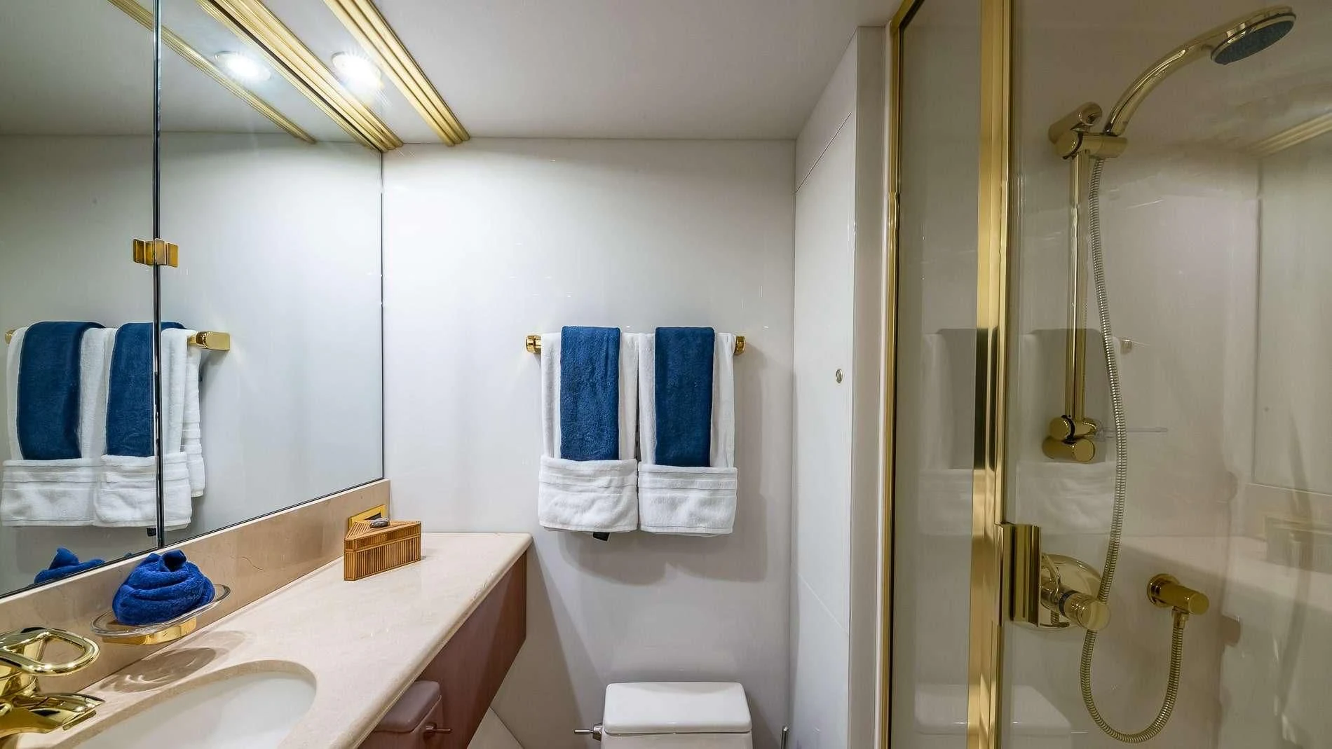 a bathroom with a sink and a shower aboard TRANQUILITY IV Yacht for Sale