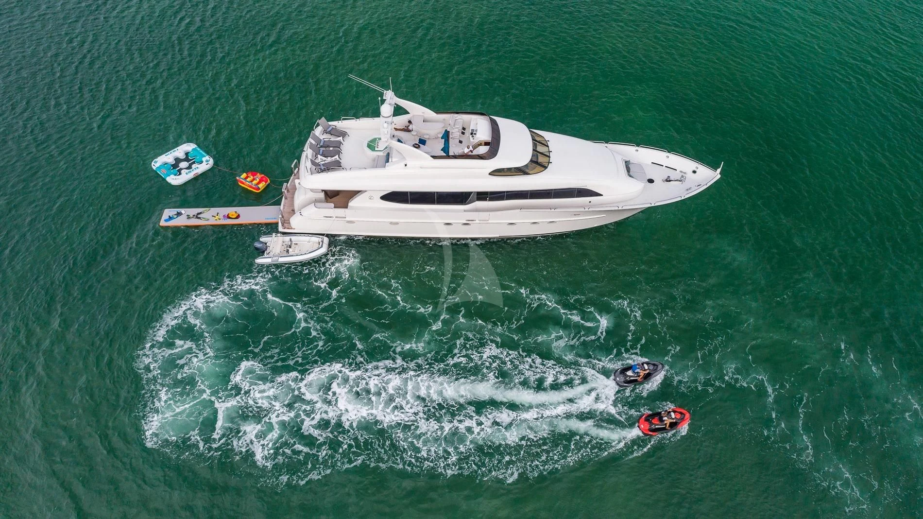 a boat in the water aboard TRANQUILITY IV Yacht for Sale
