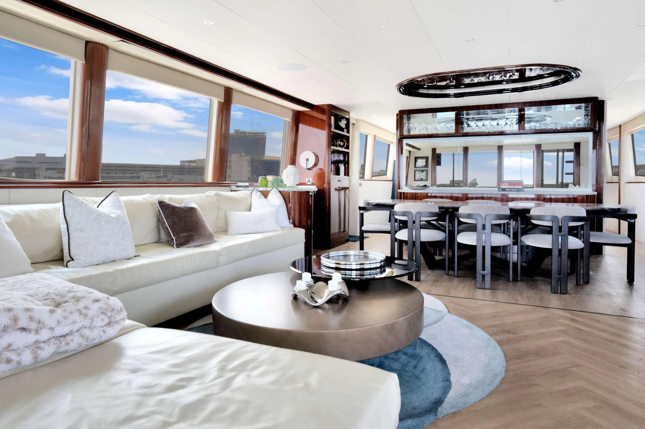 a living room with a large window aboard TRANQUILITY IV Yacht for Sale