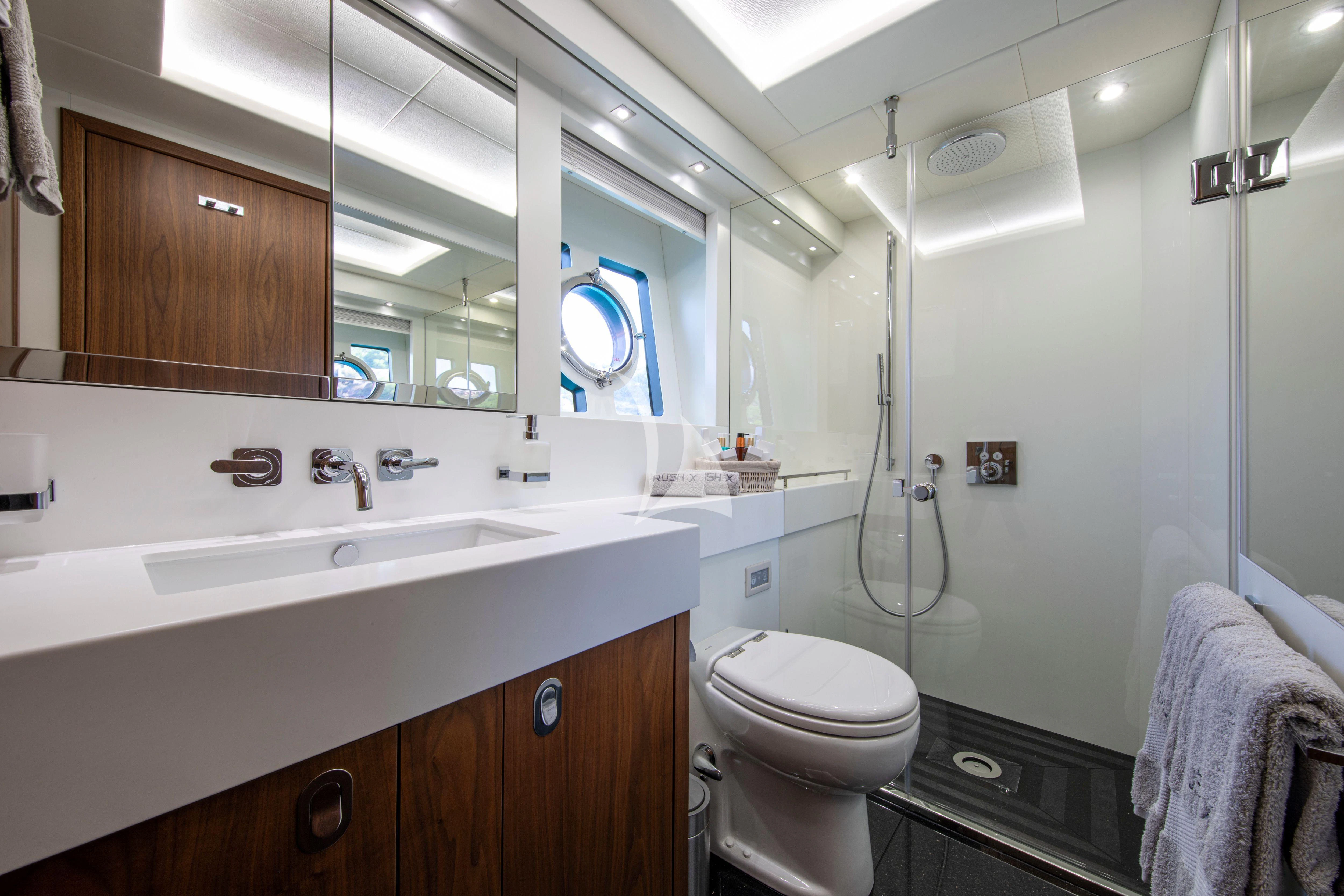 a bathroom with a sink and toilet aboard RUSH X Yacht for Sale