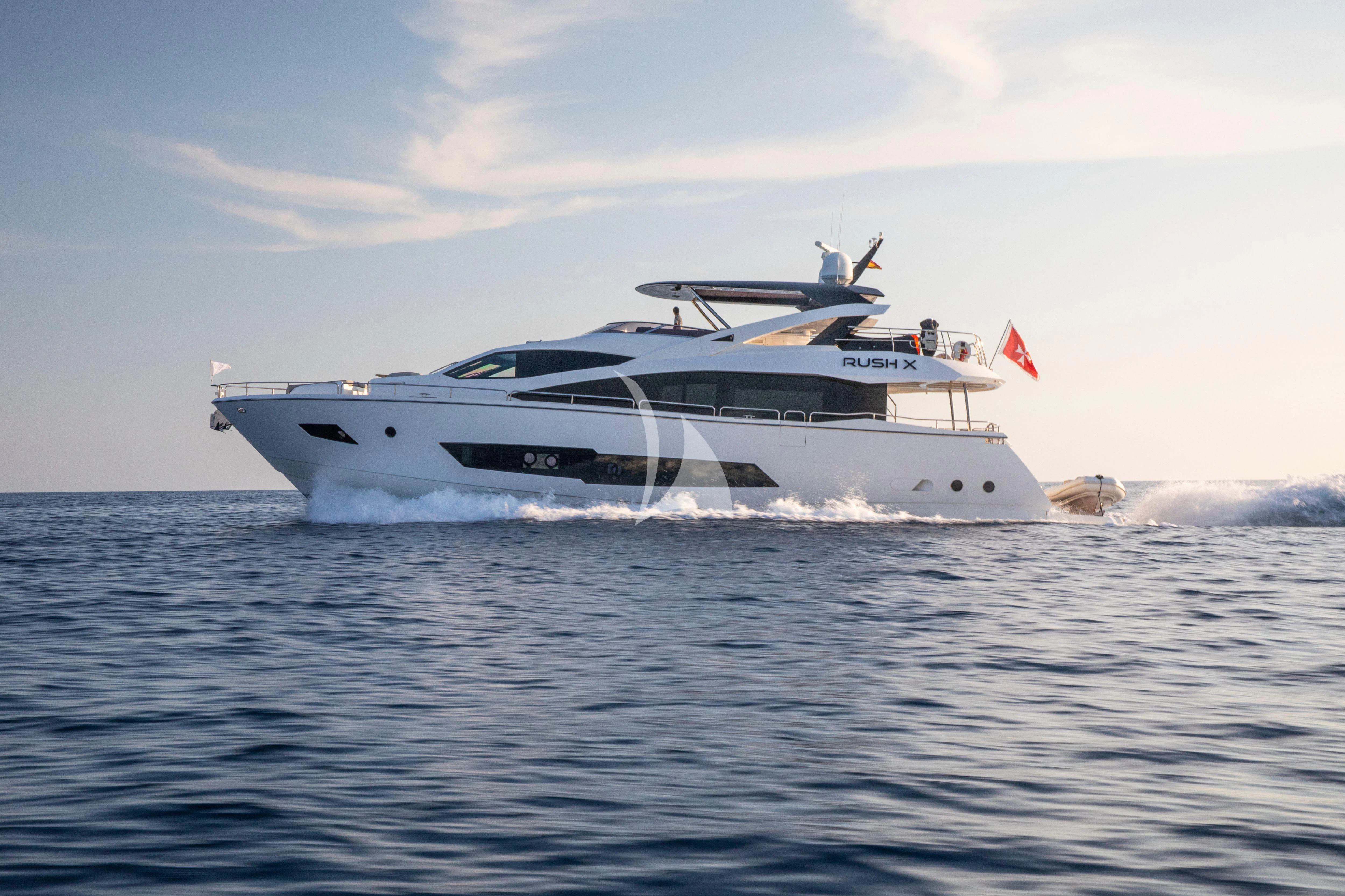 a yacht in the water aboard RUSH X Yacht for Sale