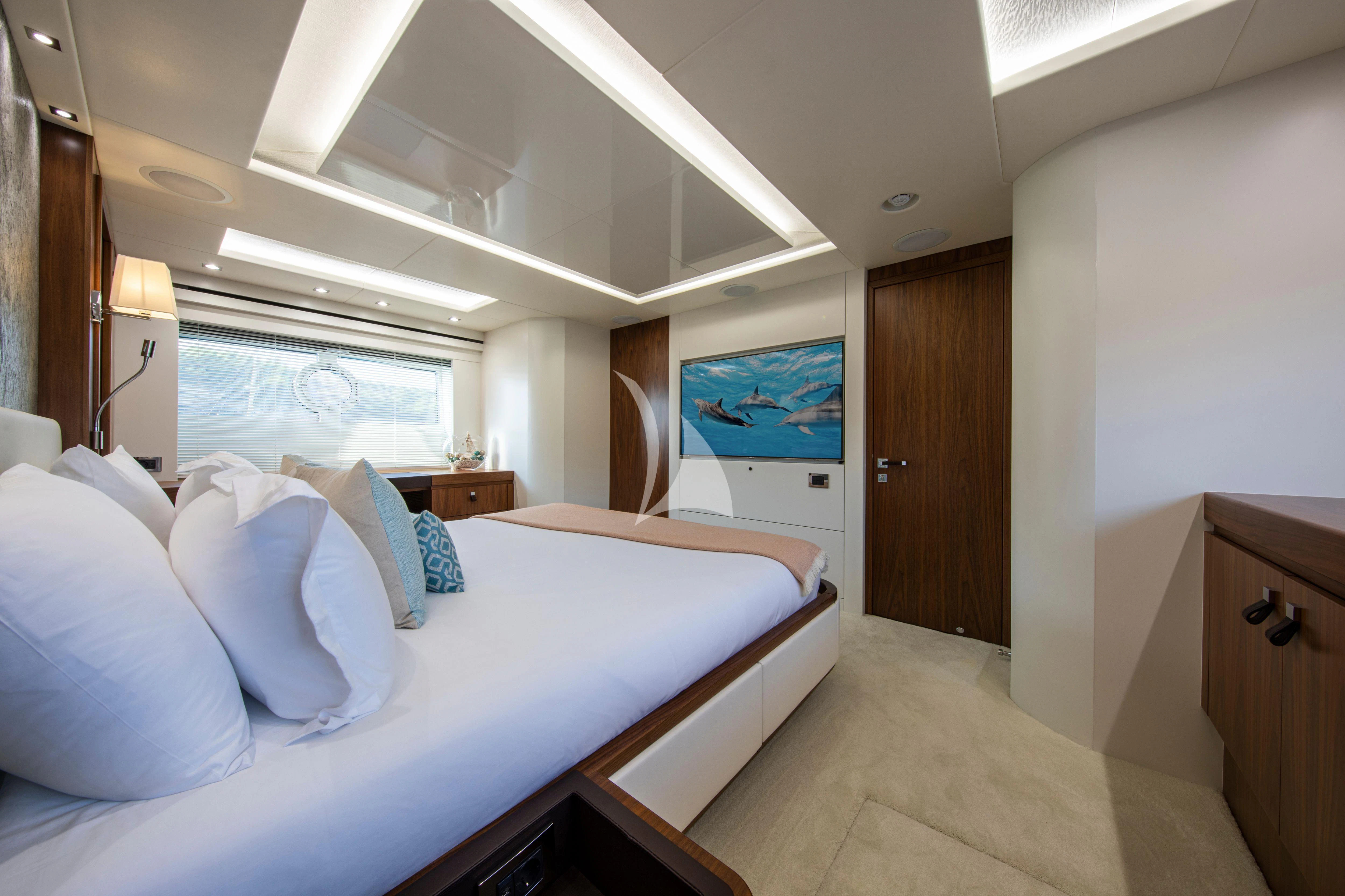 a room with two beds aboard RUSH X Yacht for Sale